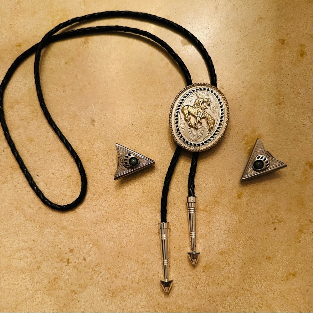 Cowboy Lariat with black leather cord. Includes collar tips & vest extension!